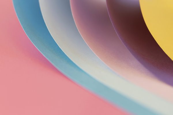 curved-layers-colored-papers-close-up-scaled