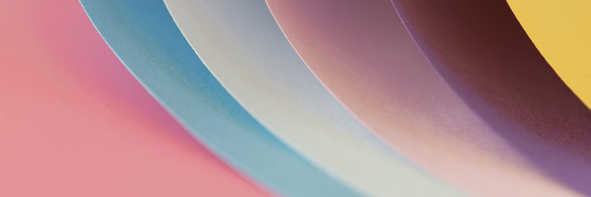 curved-layers-colored-papers-close-up-scaled